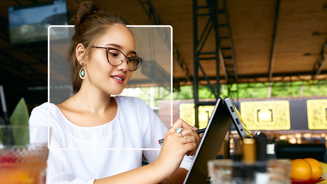 Woman working on touchscreen
